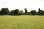 View of Queens' Field Victoria Park with trees in background